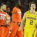 Michigan freshman Spike Albrecht celebrates after hitting a three-pointer over Syracuse senior Brandon Triche in the Final Four in Atlanta on Saturday, April 6, 2013. Melanie Maxwell I AnnArbor.com